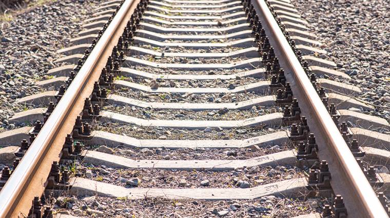 web old-slightly-rusty-railroad-tracks-on-which-trains-still-ride