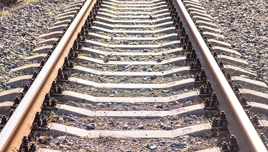 web old-slightly-rusty-railroad-tracks-on-which-trains-still-ride