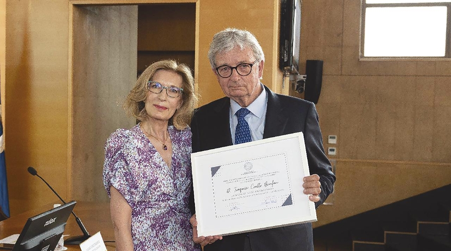 La decana del COIN, Pilar Tejo, junto a Joaquim Coello Brufau.