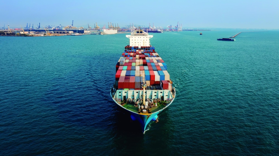 Container ship full load carrying for import and export, business cargo logistic and transportation by container ship in open sea, photograph from drone camera front view of container ship, Transportation concept