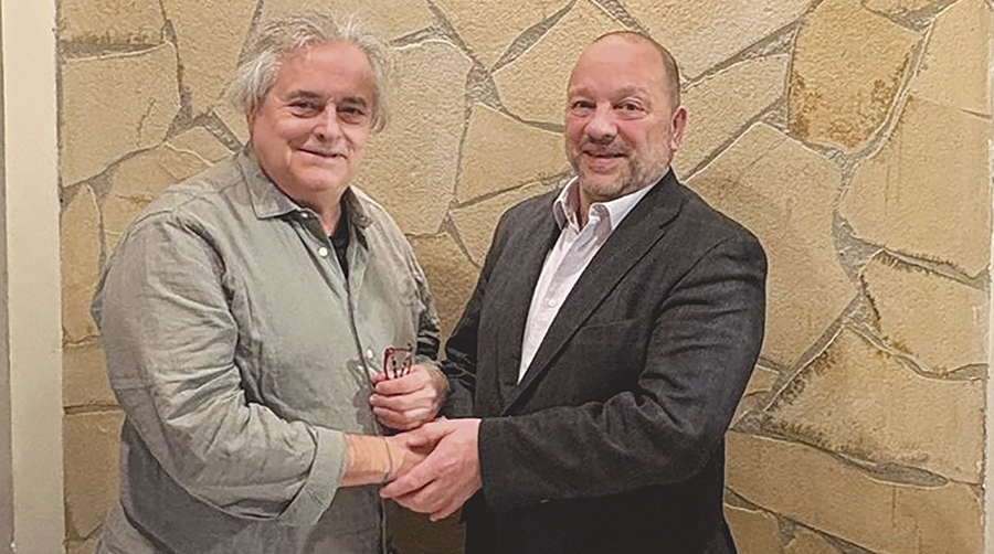 Enric Ticó, presidente de FETEIA-OLTRA y Juan Manuel Martínez Mourín, presidente de la AET.